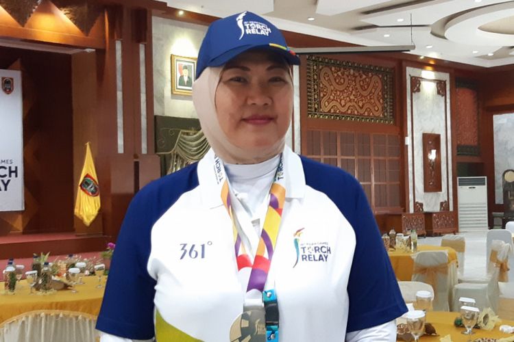 Verawaty Fajrin saat menjadi salah satu pembawa obor Asian Games 2018. 