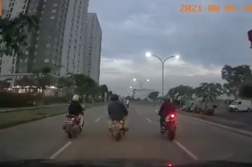 Naik Motor Sambil Ngobrol Bisa Didenda Rp 750.000