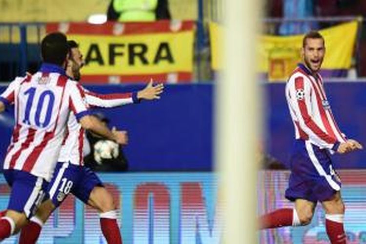 Para pemain Atletico Madrid merayakan gol pembuka Mario Suarez ke gawang Bayer Leverkusen saat leg kedua babak 16-besar final Liga Champions,  Vicente Calderon, Selasa atau Rabu (18/3/2015) dini hari WIB.