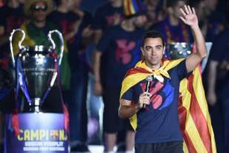 Xavi Hernandez kala merayakan keberhasilan Barcelona meraih gelar Liga Champions di Stadion Camp Nou, pada 7 Juni 2015.