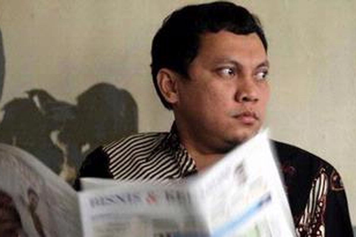 Gayus Halomoan Tambunan, tersangka kasus mafia pajak menunggu dimulai sidangnya di ruang tahanan Pengadilan Negeri Jakarta Selatan, Rabu (8/9/2010). 