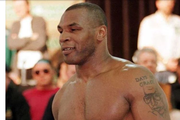 Tato Che Guevara yang ada di rusuk Mike Tyson.