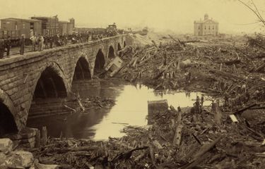 Debris at Pennsylvania Railroad stone bridge, after the Johnstown Flood of May 31, 1889. This was the most horrific site of the disaster. The bridge blocked the onslaught of tons of debris, carried by
