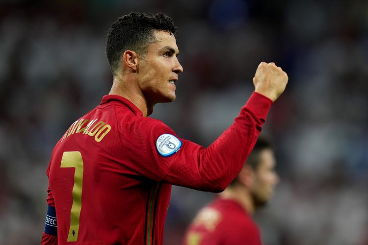 BUDAPEST, HONGARIA - 23 JUNI: Penyerang Portugal, Cristiano Ronaldo, melakukan selebrasi usai mencetak gol pertama ke gawang Perancis pada laga Grup F Euro 2020 versus Perancis di Puskas Arena, Hongaria, pada 23 Juni 2021.