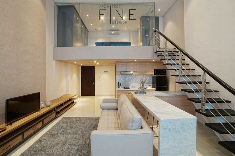 Dekorasi ruang keluarga Brooklyn Soho & Apartment di Tangerang karya Fine Team Studio.