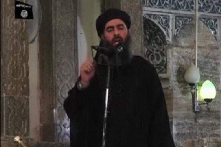 Pemimpin ISIS, Abu Bakr al-Baghdadi di sebuah masjid di kota Mosul, Irak, 5 Juli 2014