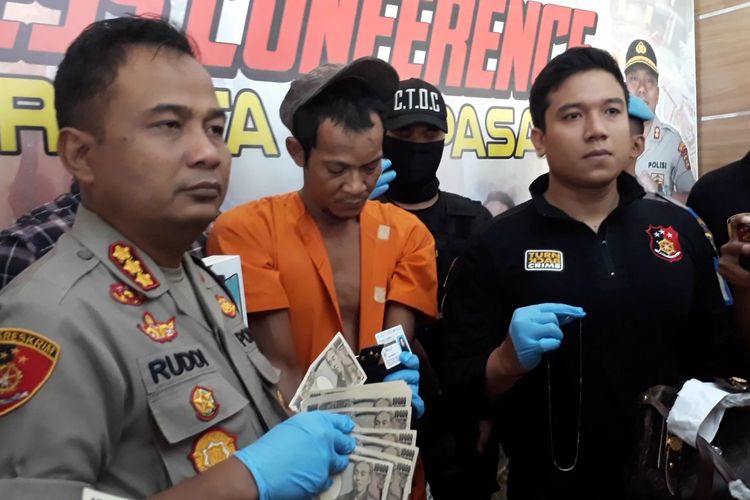 Pelaku saat diamankan di Polresta Denpasar, Kamis (28/11/2019)