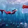Cerita Gubernur Malut Sherly Tjoanda Kibarkan Bendera di Bawah Laut Pakai Kostum Mermaid