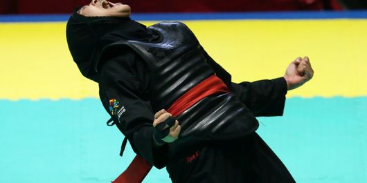 Pesilat putra Indonesia, Pipiet Kamelia meluapkan kegembiraan setelah meraih medali emas pada partai final nomor kelas D putri 60 kg sampai 65 kg Asian Games 2018 di Padepokan Pencak Silat, TMII, Jakarta, Rabu (29/8/2018). Ia mengalahkan pesilat asal Vietnam Nguyen Thi Cam Nhi.