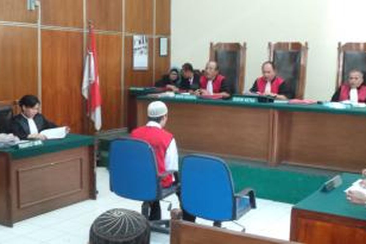 Dadang Supriyatna menjalani sidang putusan di Pengadilan Negeri Jakarta Utara. Selasa (9/9/2014).