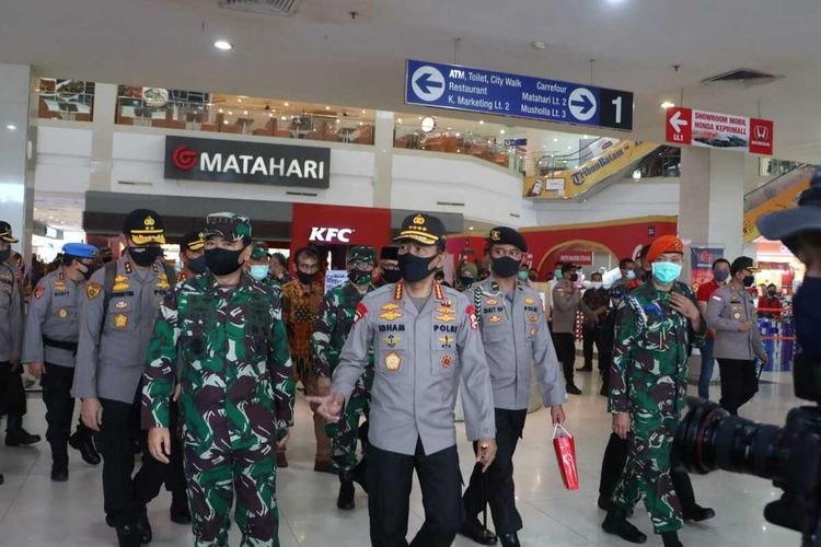 Toward the new normal Indonesian Military Commander Air Chief Marshal Hadi Tjahjanto and National Police Chief General Idham Aziz inspect several places in Batam, Riau Province on June 12. 
