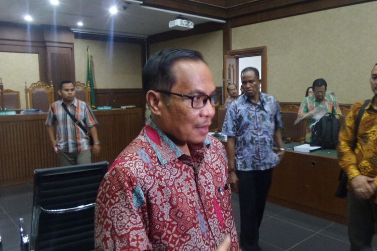 Mantan Dirjen Kependudukan dan Catatan Sipil Kementerian Dalam Negeri, Irman, di Pengadilan Tipikor Jakarta, Senin (12/6/2017).