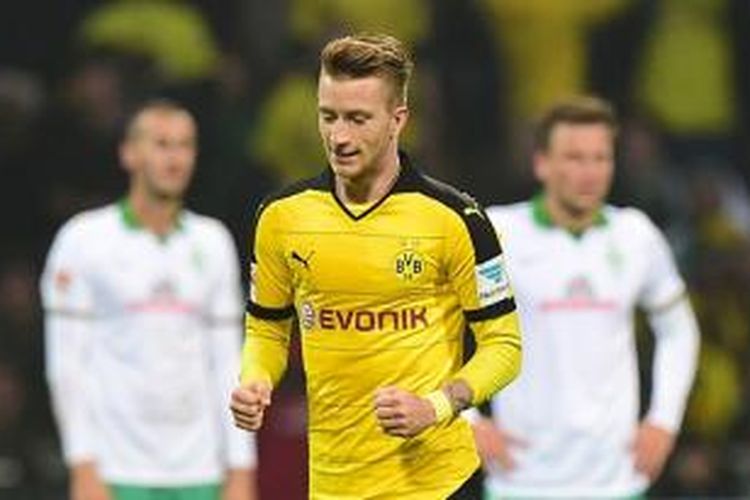 Marco Reus mencetak 2 gol kemenangan Borussia Dortmund di kandang Werder Bremen, Sabtu (31/10/2015). 