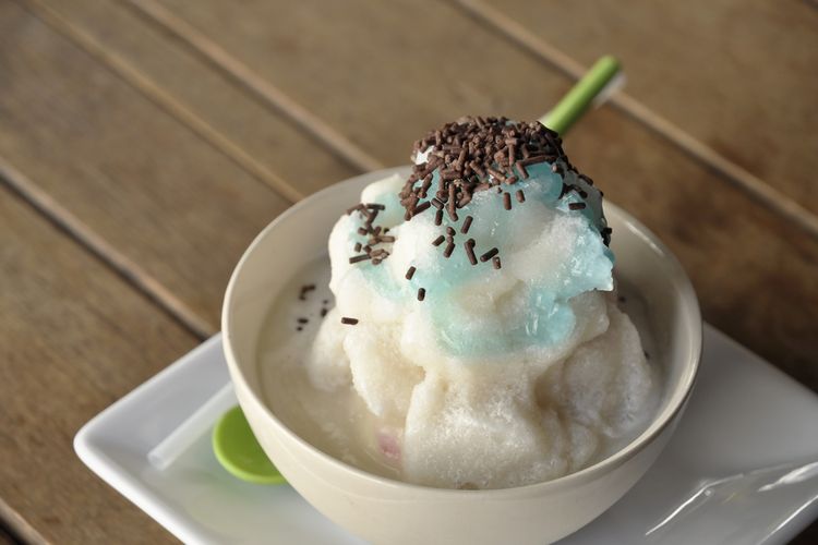 Ilustrasi snow cream adalah jenis es krim khas Thailand terbuat dari serutan susu beku. 