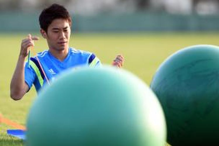 Penyerang Jepang, Shinji Kagawa, mengikuti sesi latihan di Itu, Sao Paulo, pada 15 Juni 2014.