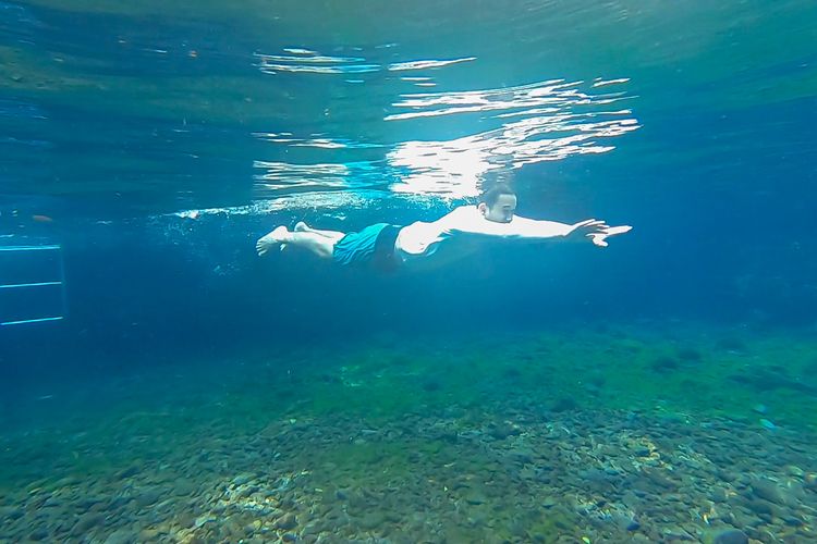 Wisatawan berenang di Umbul Nilo, Klaten.
