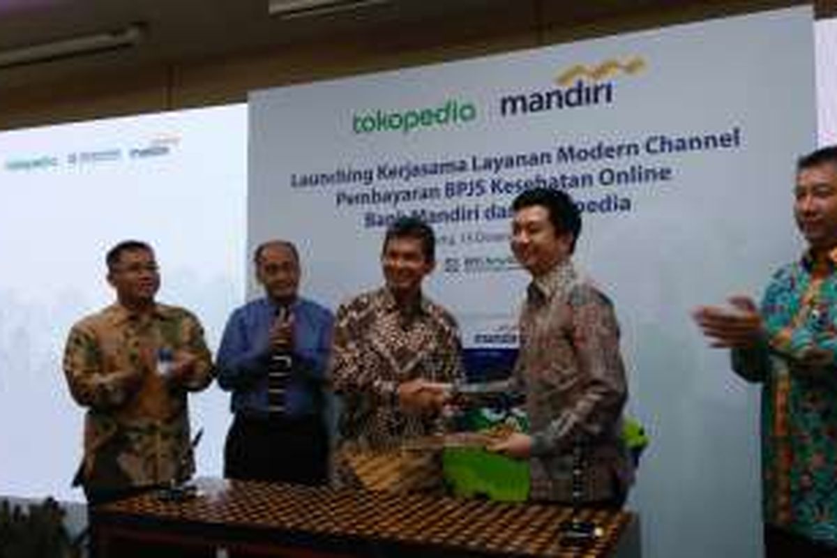 Acara Kerja Sama Bank Mandiri dan Tokopedia dalam mempermudah pembayaran BPJS Kesehatan di Plaza Mandiri, Jakarta, (15/12/2016).