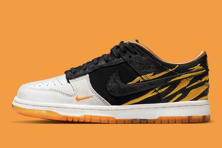 Nike telah merilis edisi khusus Dunk Low Year of the Tiger untuk Imlek tahun ini. Merek perlengkapan olahraga asal AS ini menampilkan sisi dekoratifnya dengan memberikan warna oranye dan kuning cerah.