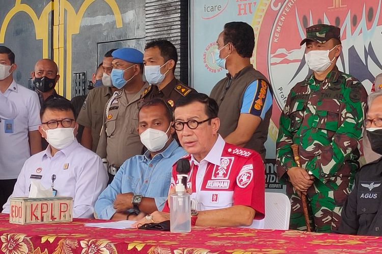Law and Human Rights Minister Yasonna Laoly (2nd-right, seated) speaks to a press conference after a fire engulfed a Tangerang Prison in Indonesia's Banten province, killing 41 inmates on Wednesday, September 8, 2021. 