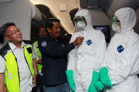 Antisipasi Virus Corona, Kru Pesawat yang Jemput WNI di China Pakai Pakaian Khusus