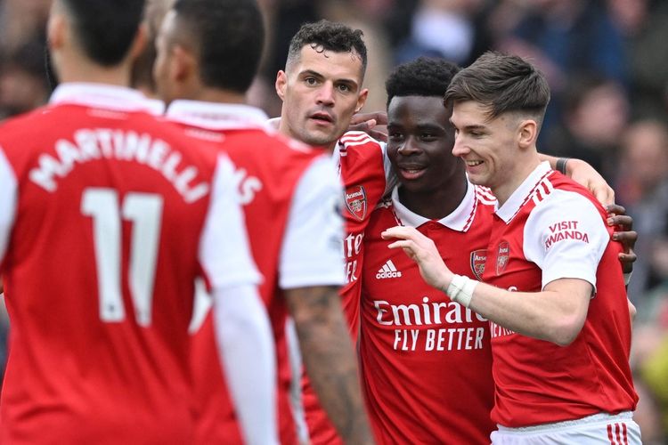 Para pemain Arsenal merayakan kemenangan kontra Crystal Palace pada lanjutan laga Inggris di Stadion Emirates, London, Minggu (19/3/2023). Terkini, Arsenal akan menjamu Leeds United pada laga pekan ke-29 Liga Inggris 2022-2023.