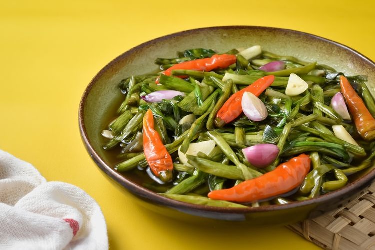 ilustrasi tumis genjer. 