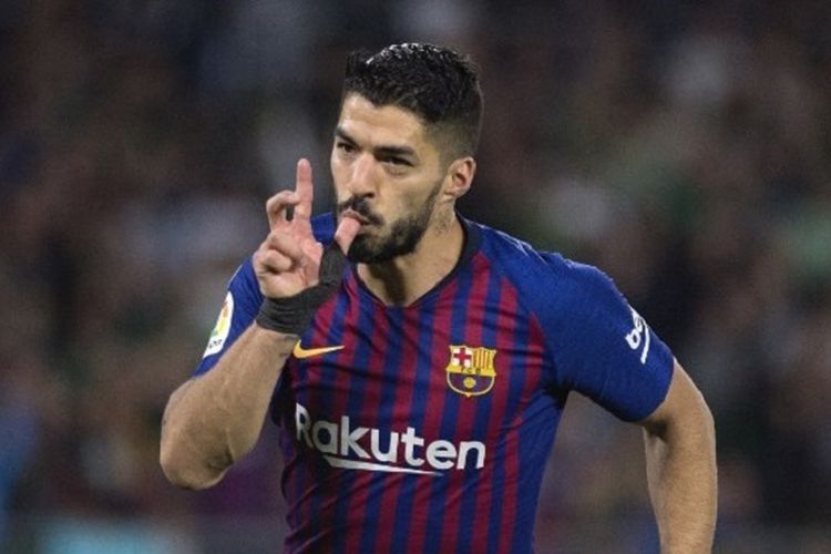 Luis Suarez merayakan golnya pada pertandingan Real Betis vs Barcelona di Stadion Benito Villamarin dalam lanjutan La Liga Spanyol, 17 Maret 2019. 