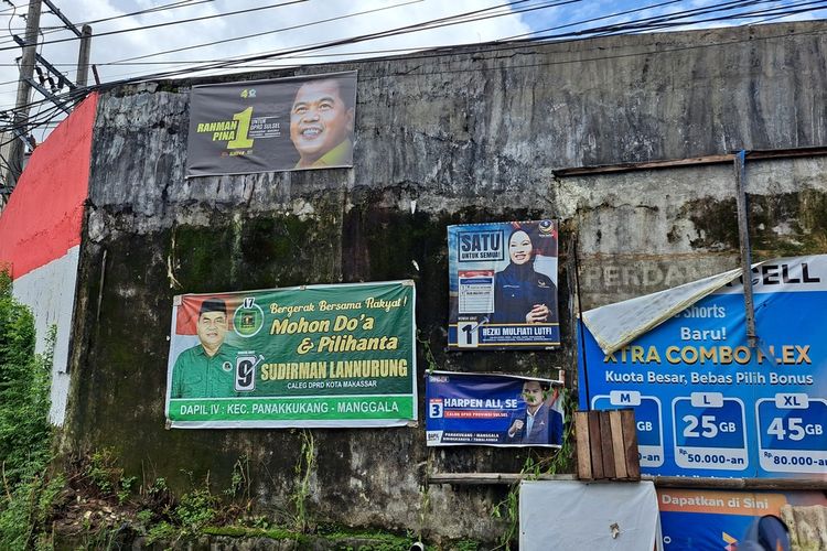 Sejumlah APK Caleg DPRD Kota Makassar dan Provinsi Sulsel masih terpasang dihari terakhir masa tenang Pemilu 2024, lokasi APK ini berada di Jalan AP Pettarani 6 Makassar, Sulsel, Selasa (13/2/2024)