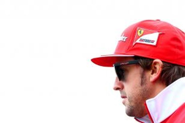 Pebalap Ferrari asal Spanyol, Fernando Alonso, ketika berada di paddock Sirkuit Gilles Villeneuve, Kanada, Kamis (5/6/2014).