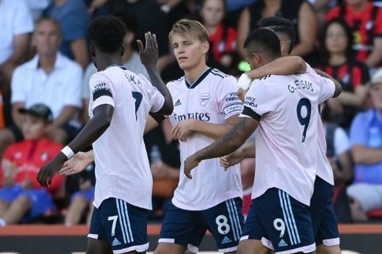 Martin Odegaard berselebrasi usai mencetak gol dalam laga Bournemouth vs Arsenal pada pekan ketiga Liga Inggris 2022-2023 yang digelar di Stadion Vitality, Sabtu (20/8/2022) malam WIB. (Photo by Alex Davidson/Getty Images) (Photo by Alex Davidson / GETTY IMAGES EUROPE / Getty Images via AFP)