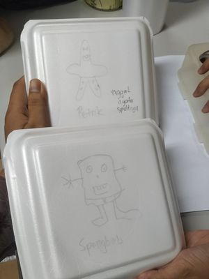 Kotak makanan dari Asobi Cafe bergambar Spongebob dan Patrick hasil pesanan Crodim 