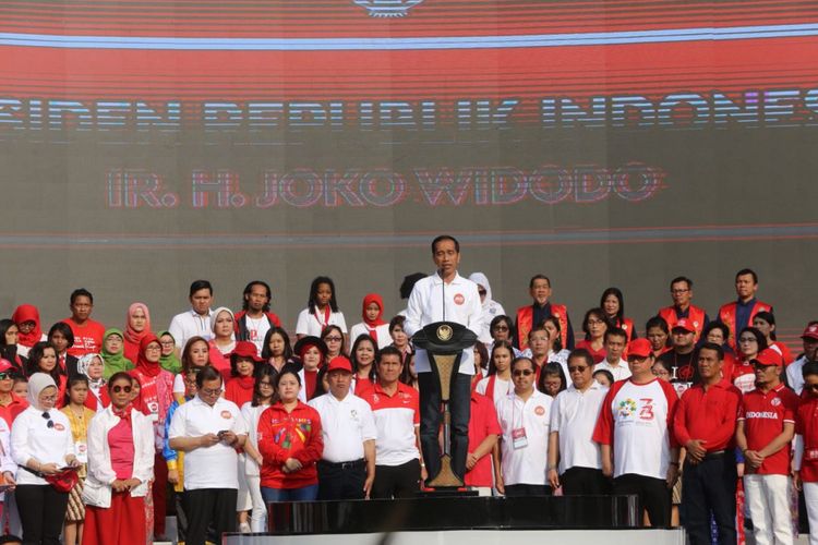 Menteri Koordinator Bidang Pembangunan Manusia dan Kebudayaan (Menko PMK) Puan Maharani mendampingi Presiden Joko Widodo menghadiri acara Harmoni Indonesia 2018, di Plaza Timur Gelora Bung Karno, Minggu (5/8/2018)