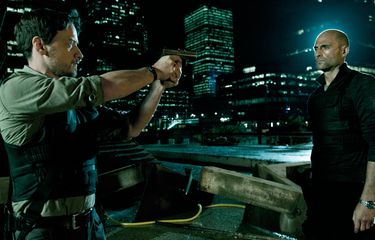 James McAvoy dan Mark Strong dalam film Welcome to the Punch