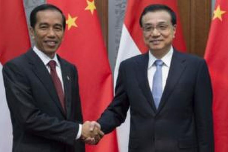Joko Widodo bertemu Xi Jinping menjelang pertemuan pemimpin APEC. 