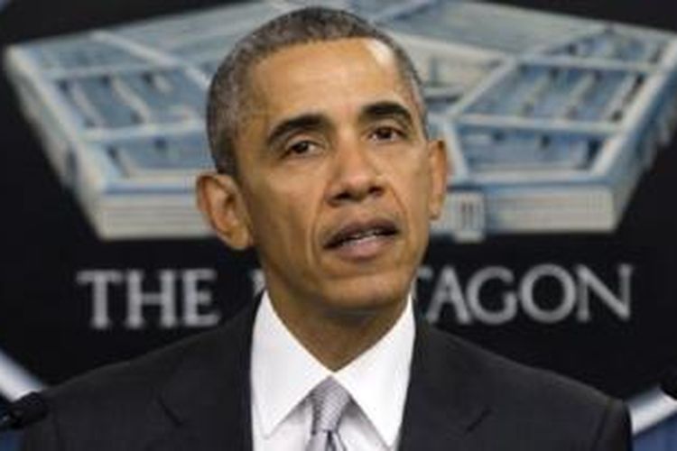 Presiden AS Barack Obama berbicara di Pentagon mengenai perang melawan kelompok militan ISIS, Senin (14/12/2015).