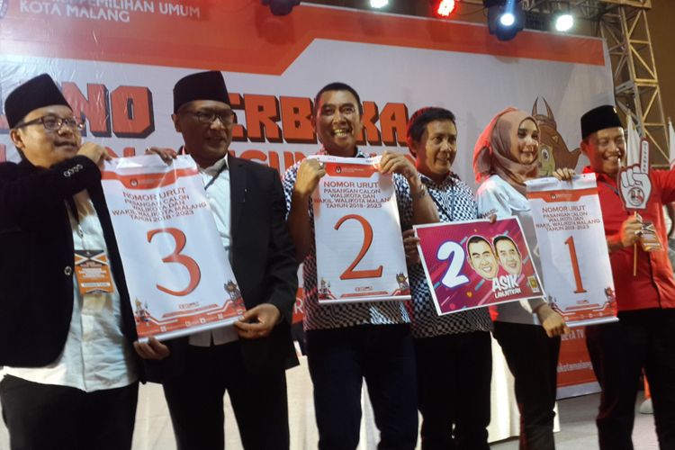 Tiga pasangan calon dalam Pilkada Kota Malang saat menunjukkan nomor urut yang didapatnya, Selasa (13/2/2018)