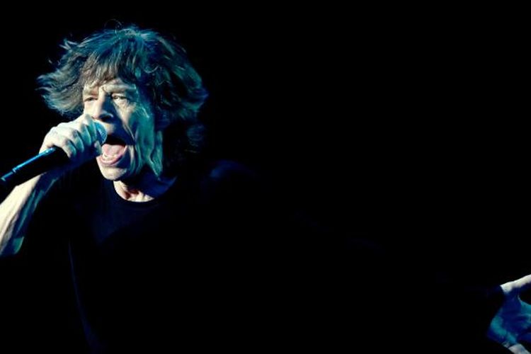 Mick Jagger, vokalis Rolling Stones. Gambar diambil saat dia tampil dalam konsernya di China pada 12 Maret 2014.