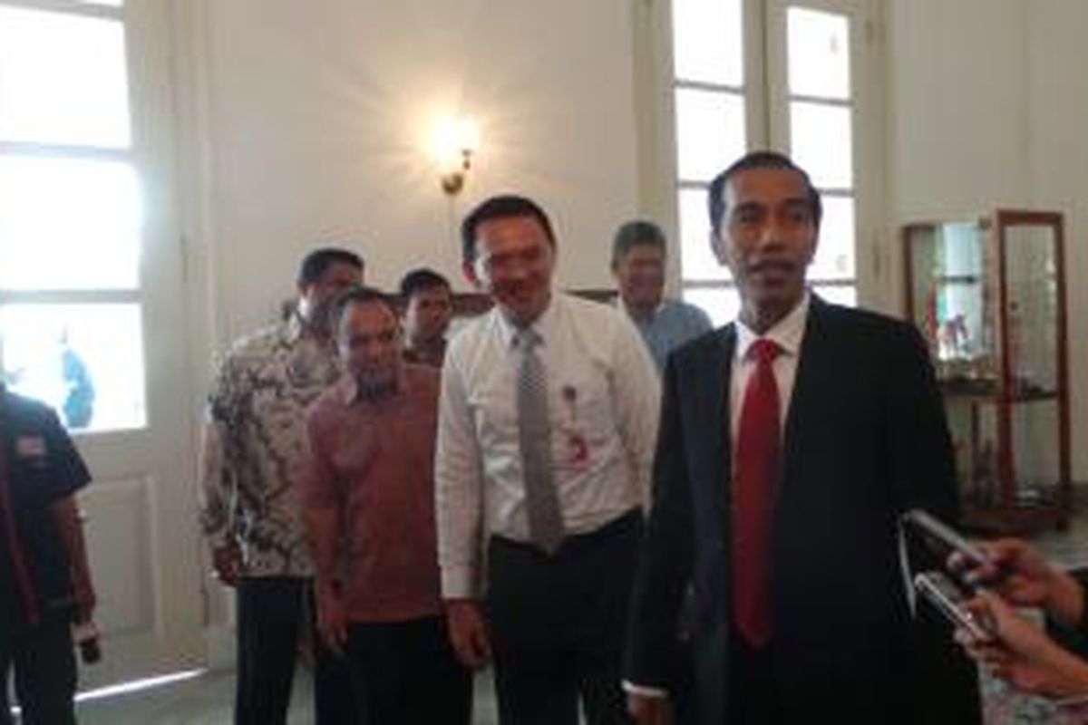 Gubernur DKI Jakarta Joko Widodo dan Wakil Gubernur DKI jakarta Basuki Tjahaja Purnama seusai melakukan pertemuan tertutup selama tiga jam, di Balaikota Jakarta, Rabu (23/7/2014).