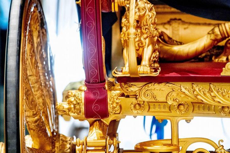 The carriage is made of teak wood and covered in gold leaf