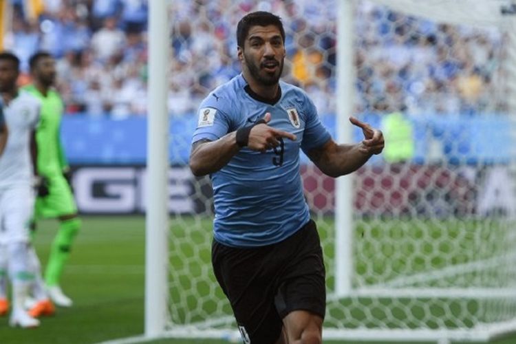 Luis Suarez merayakan golnya pada laga Uruguay vs Arab Saudi di Rostov Arena, 19 Juni 2018. 