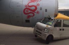 Sebuah Minibus Tabrak Pesawat Maskapai Dragon Air di Bandara Hongkong