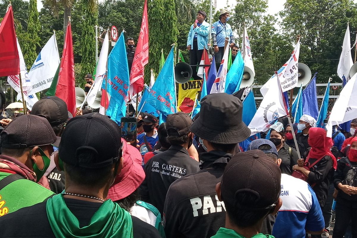 Workers stage protest against the newly passed Job Creation Law in Bogor, West Java on Friday October 16, 2020. 