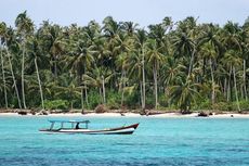 Wanita Berhijab Jangan Pakai Busana Berlapis Saat ke Pantai