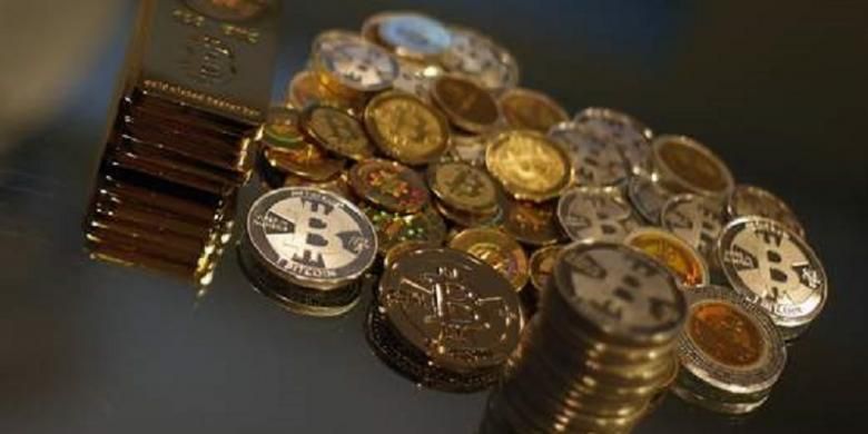 Ilustrasi mata uang virtual atau mata uang kripto, salah satunya yakni bitcoin