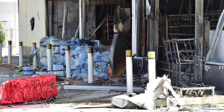 This picture shows a convenience stores damaged after an attack, in Cho-airong district in southern Thailand's Narathiwat province, on August 17, 2022. Several arsons and explosions rocked multiple locations in Thailand's three southernmost provinces in the night of August 16 and 17, 2022.
Madaree TOHLALA / AFP