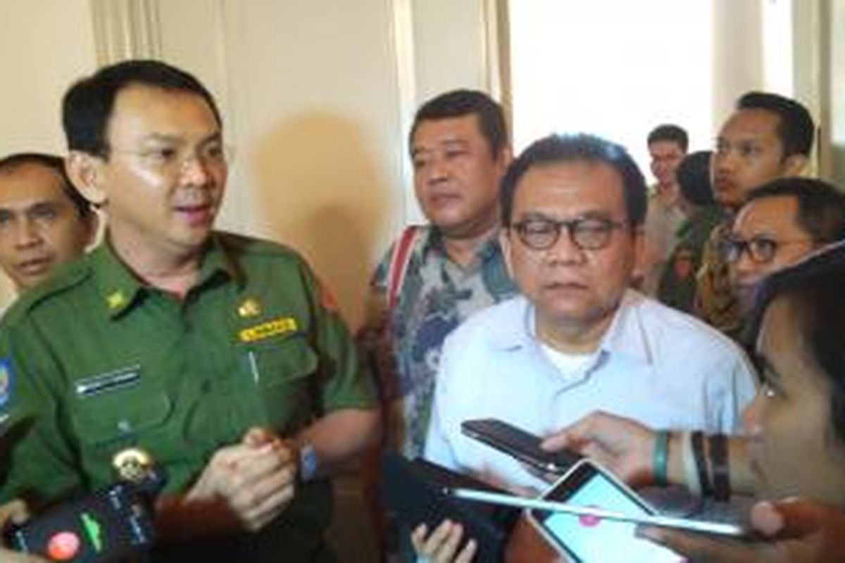 Gubernur DKI Basuki Tjahaja Purnama dan Wakil Ketua DPRD DKI Mohamad Taufik. 