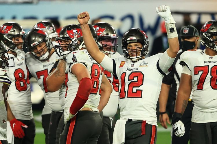 TAMPA, FLORIDA - FEBRUARY 07: Tom Brady #12 of the Tampa Bay Buccaneers reacts after defeating the Kansas City Chiefs in Super Bowl LV at Raymond James Stadium on February 07, 2021 in Tampa, Florida. The Buccaneers defeated the Chiefs 31-9.   Mike Ehrmann/Getty Images/AFP