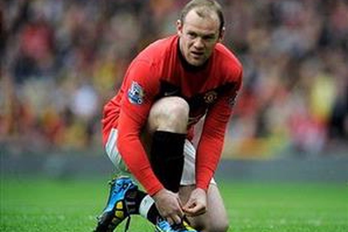 Penyerang Manchester United, Wayne Rooney.