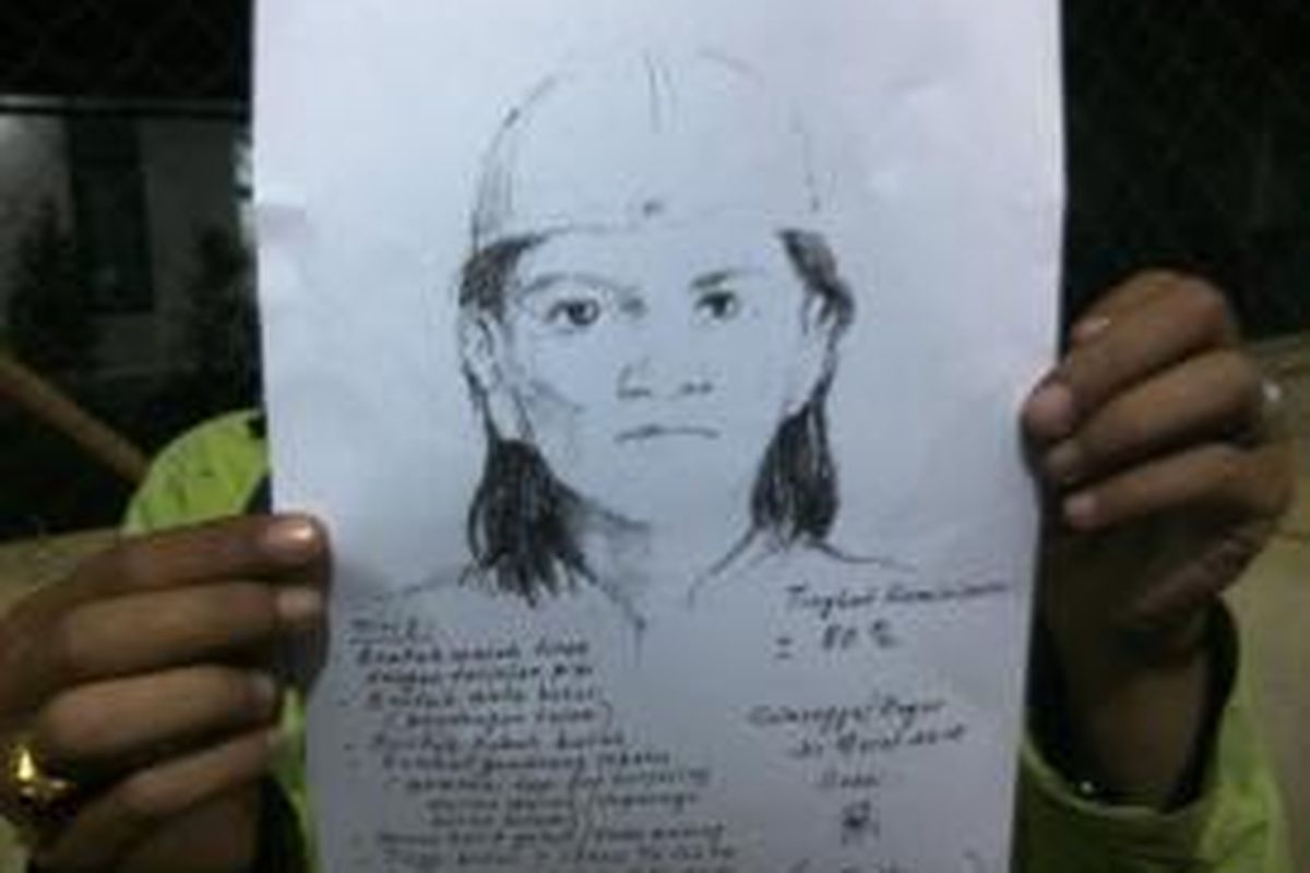 Polisi menggambar sketsa wajah salah satu pelaku begal yang menewaskan Ahmad Markus (25), Selasa (31/3/2015). Ia tewas setelah kawanan begal menembak bagian lehernya. K97-14