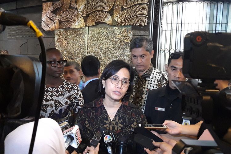 Finance Minister Sri Mulyani Indrawati speaks to journalists at an event in Jakarta on Thursday, January 30, 2020.  